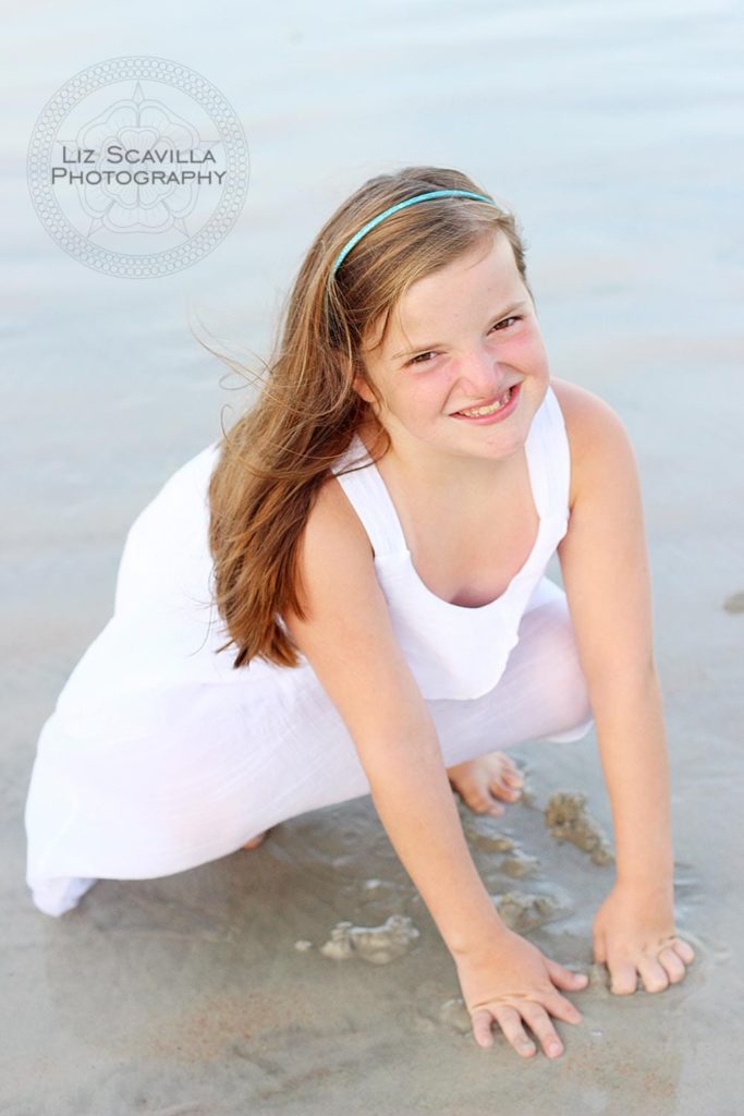 Girl playing in the sand
