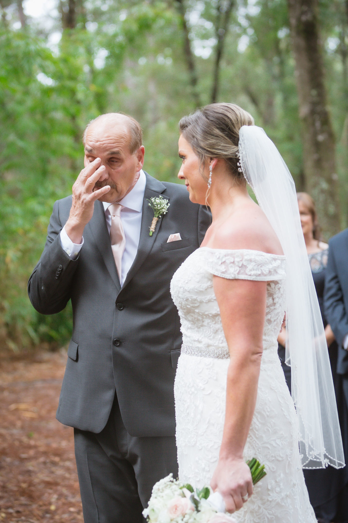 Father of the bride in an emotional moment.